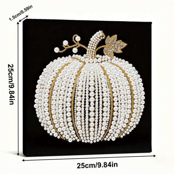 Decorative pumpkin with pearls and gold accents on a black background, with measurements indicated.