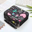 Black pencil case with colorful designs on a desk with pencils and a keyboard.