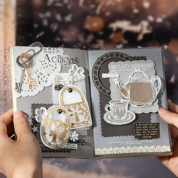 Open notebook with decorative cutouts and text held by a person.