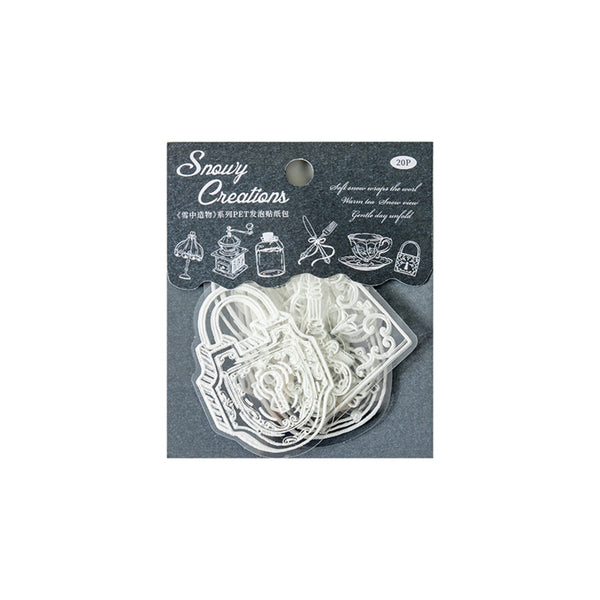 Packaged set of clear silicone molds with 'Snowy Creations' branding on a gray background