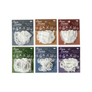 Set of six clear stamp sets with decorative designs on Spooky Creations packaging.