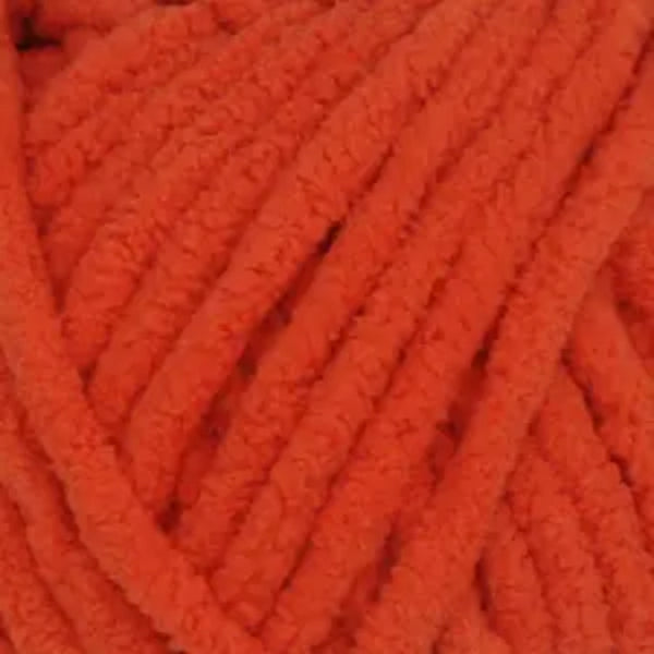 Close-up of bright orange yarn ball