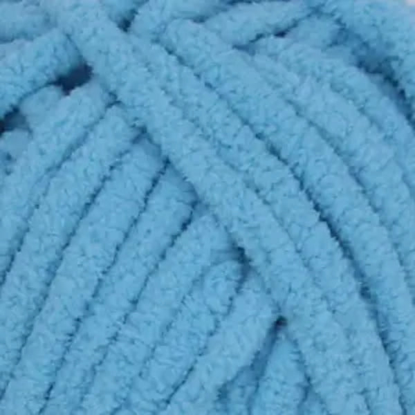 Close-up of a ball of blue yarn