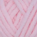 Close-up of pink yarn with a soft focus