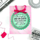 Decorative card with Bible verse and pink bow, surrounded by crafting supplies.