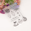 Clear stamp set with Christmas-themed designs on a white background with flowers.