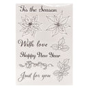 Clear stamp set with Christmas designs and text on a white background