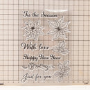 Clear stamp set with Christmas designs and text on a grid background