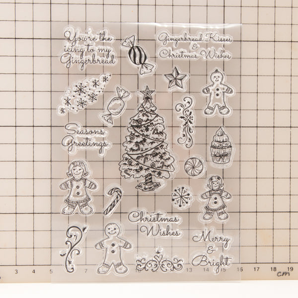 Set of Christmas-themed stamps on a grid background