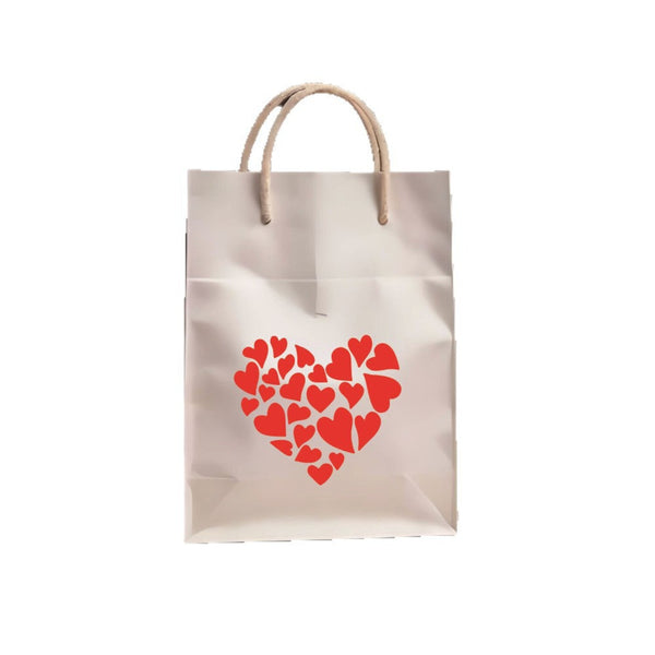 Beige paper bag with red heart design on a white background