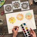 Artistic process of painting sunflowers with stencils on a wooden table.