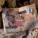 Decorative open book with vintage-style elements on a lace tablecloth.