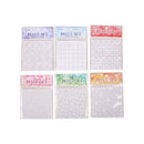 Set of six packages of polka dot pattern paper with colorful labels on a white background.