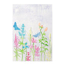 Decorative shower curtain with floral and butterfly design on a white background