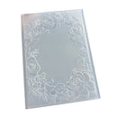 A rectangular translucent plastic sheet with an embossed floral border of roses and leaves around the edges, shown on a plain white background.