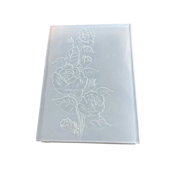 A frosted translucent plastic or glass panel featuring an embossed rose design on the front, shown against a plain white background.