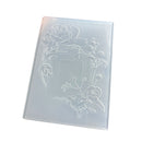 A translucent plastic photo frame mold with embossed floral designs and a central blank frame area, shown on a plain white background.