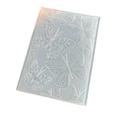 A translucent silicone mold with embossed butterfly and leaf patterns, shown at an angle on a white background.