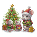 Cross-stitched design of three mice in festive clothing near a decorated Christmas tree.