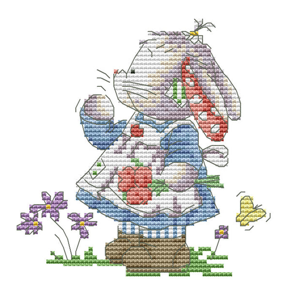 Cross-stitched design of a mouse holding a basket with flowers on a white background