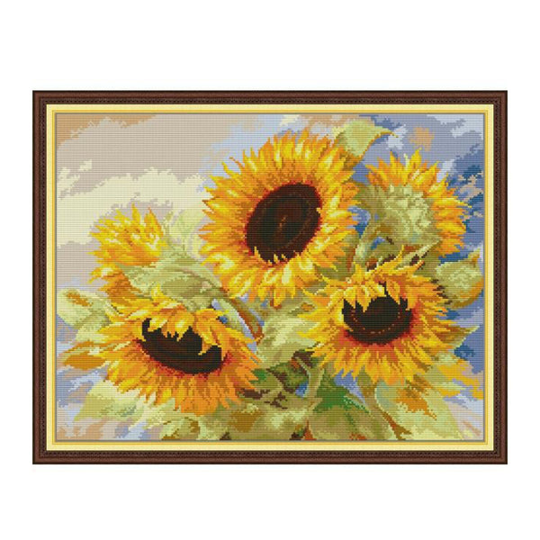 Cross-stitched sunflowers in a wooden frame on a white background