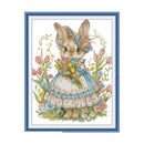 Framed artwork of a rabbit in a dress with flowers and a blue border