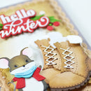 Decorative cookie with a mouse, snow boots, and 'hello winter' text on a white background