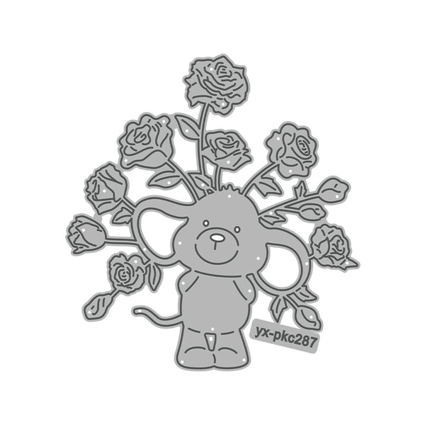 Metal die cut with elephant and roses design on a white background