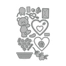 Set of clear stamps with a teddy bear, hearts, and other decorative elements on a white background.