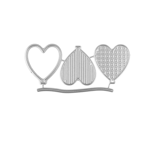 Silver tiara with heart designs on a white background