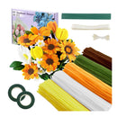 Flower arrangement kit with flowers, sticks, and tape on a white background