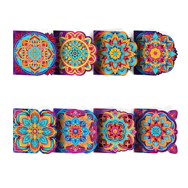 Six colorful embroidered square fabric pieces with intricate mandala and floral patterns, arranged in two rows on a plain white background.