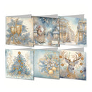 Six Christmas-themed square cards arranged in two rows on a white background. The designs feature gold and blue winter motifs including goblets, a Santa figure, illuminated buildings, a decorated tree, ornaments, and a deer.
