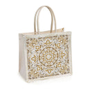 Decorative tote bag with gold mandala pattern on a white background