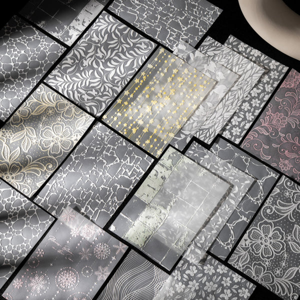 Collection of various metallic foil sheets with different patterns and textures.