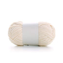 Ball of cream-colored yarn on a white background