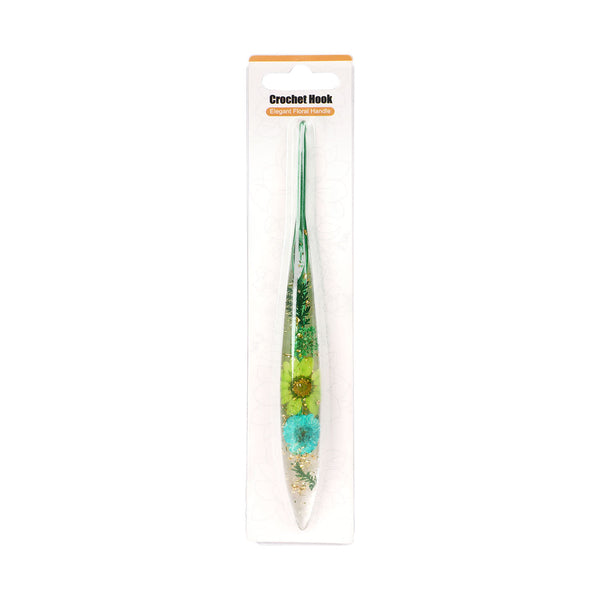 Crochet hook with floral design in packaging on a white background