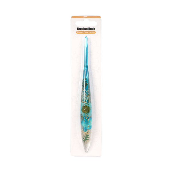 Blue crochet hook in packaging on a white background