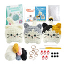 Crochet cat family kit with yarn, hooks, and instructions on a white background