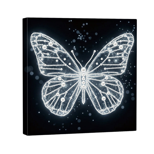 Butterfly design made of rhinestones on a black background