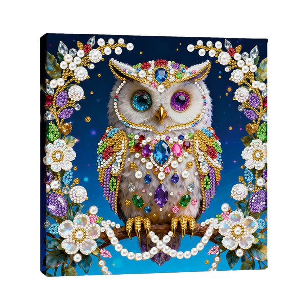 Decorative owl painting with colorful beads and pearls on a blue background