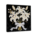 Decorative wall art with white lilies and a bow on a black background