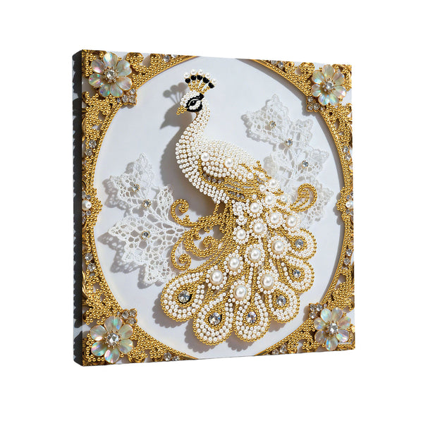 Decorative wall art with a peacock design on a white background, framed with gold and embellishments.