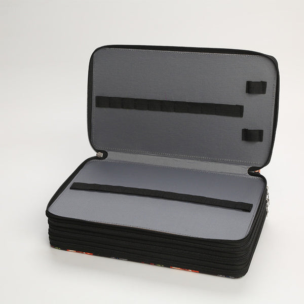Black and gray case with a clear lid on a white background