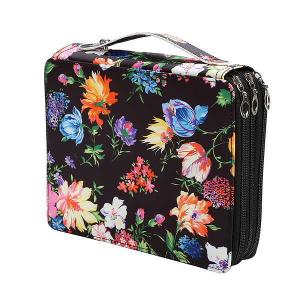 A rectangular zippered toiletry bag with a colorful floral print on a black background, featuring a top handle and silver zipper pulls, shown on a plain white background.