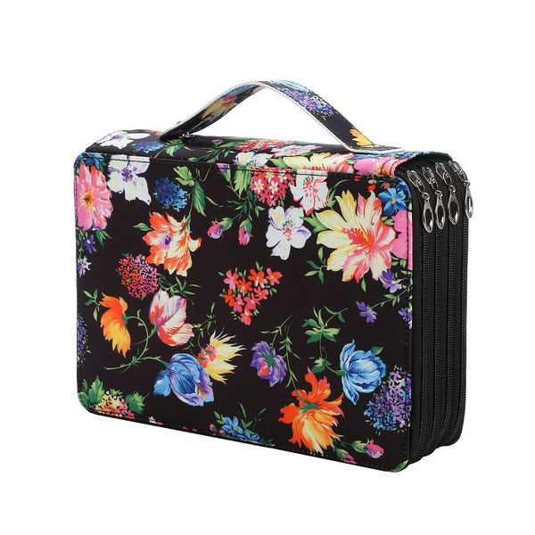 A rectangular zippered vanity case with a colorful floral print on a black background, featuring a top handle and silver zipper pulls, shown on a plain white background.