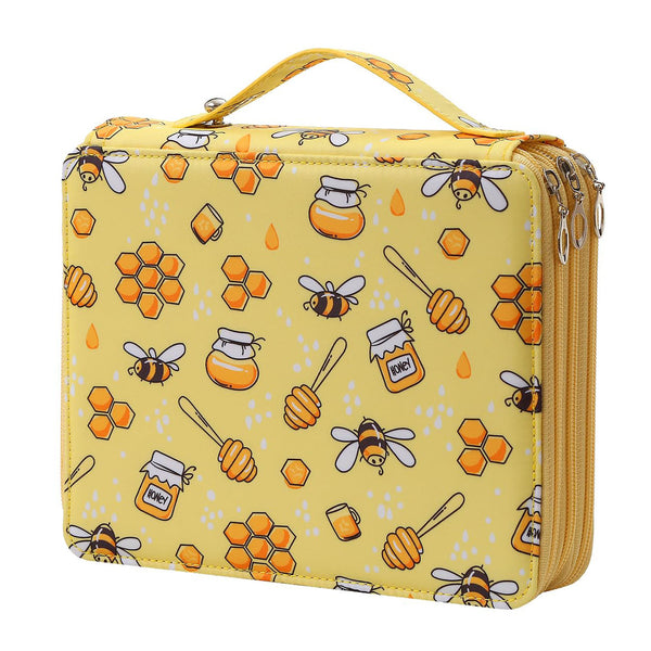 A yellow zippered lunch bag with a honeybee and honeycomb pattern, featuring a top carry handle and dual zipper compartments.