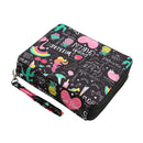 A zippered wallet with a wristlet strap, featuring a black background covered in colorful tropical and party-themed doodles and text like 'Party Queen', 'WEEKEND', and 'Gel Party'.
