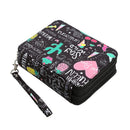 A black zippered coin purse with a wristlet strap, decorated with a colorful doodle-style pattern featuring pink hearts, green cacti, and white text, shown on a plain white background.