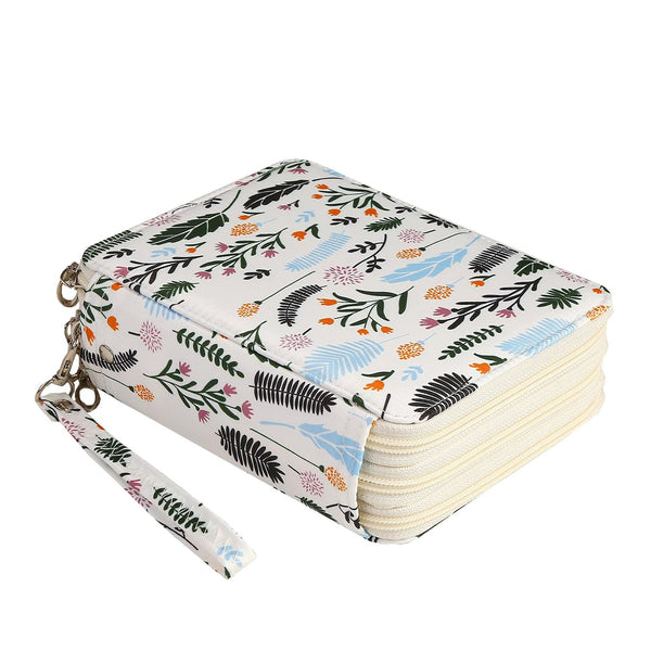 A square zippered card holder or wallet with a colorful botanical leaf pattern on a white background, featuring a matching wristlet strap and silver-tone metal hardware.
